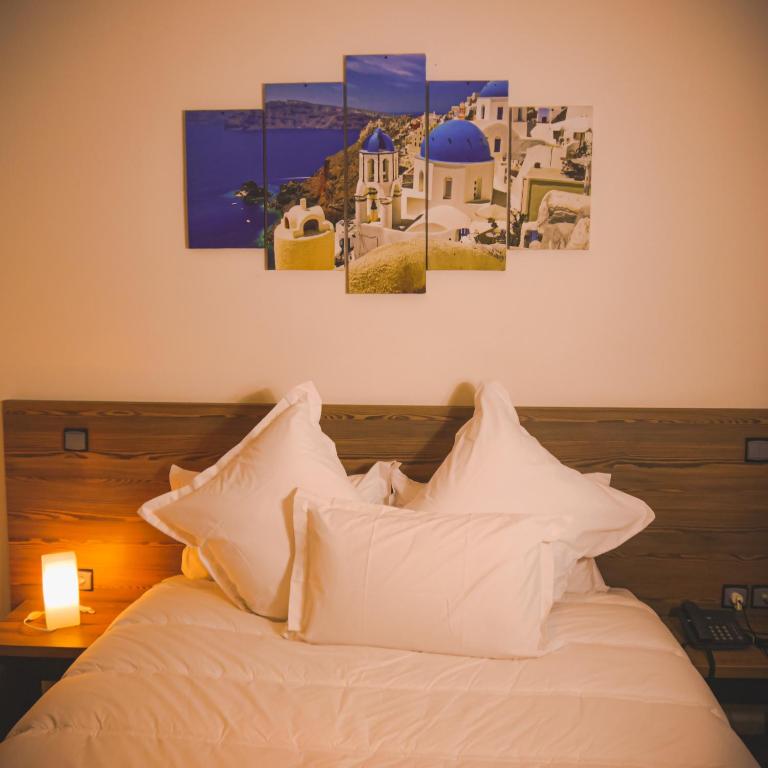 Postel nebo postele na pokoji v ubytování EL MOUSSAFIR HOTEL