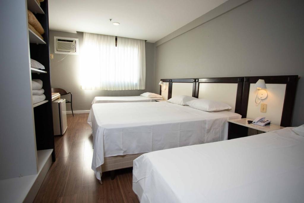 Postel nebo postele na pokoji v ubytování Master Express Alberto Bins - 200 metros do Hospital Santa Casa
