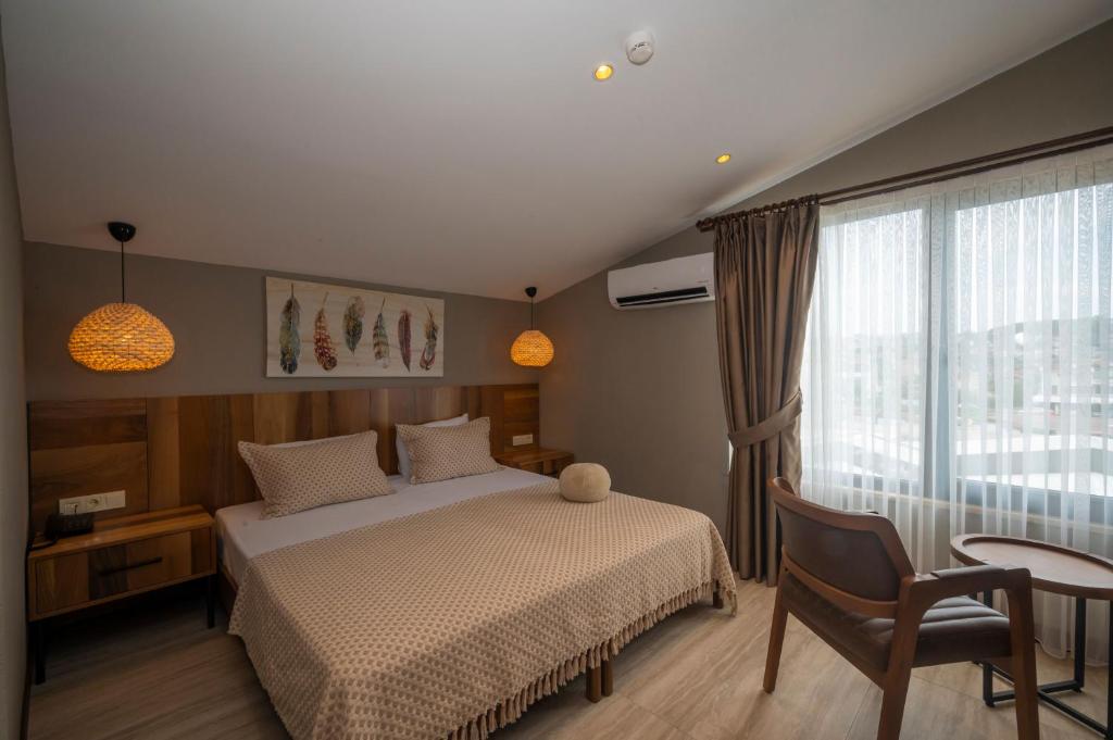 Postel nebo postele na pokoji v ubytování Villa Siesta Hotel Istanbul Airport