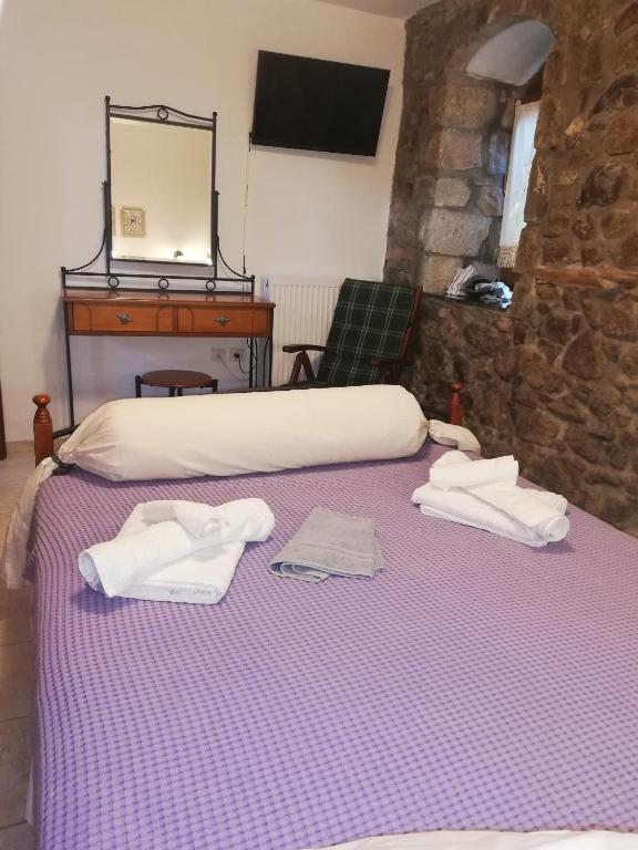 Postel nebo postele na pokoji v ubytování Samothraki