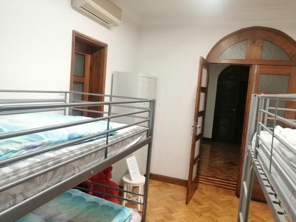Postel nebo postele na pokoji v ubytování Sasimi Nice Hostel