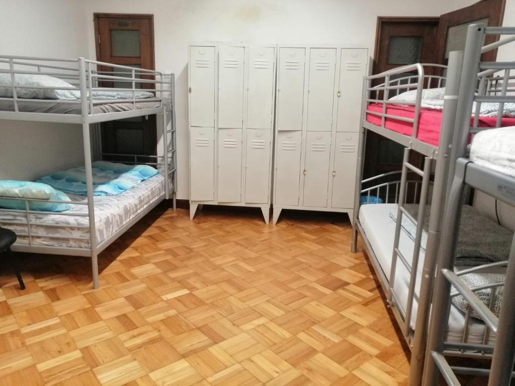 Postel nebo postele na pokoji v ubytování Sasimi Nice Hostel