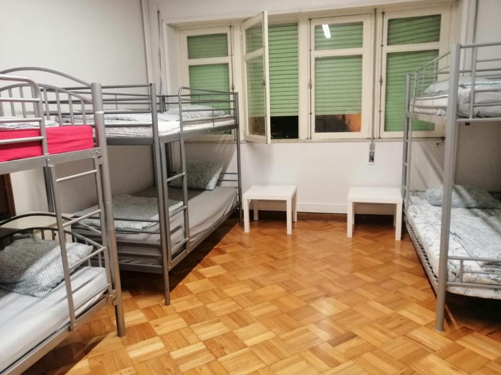 Postel nebo postele na pokoji v ubytování Sasimi Nice Hostel