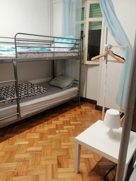 Postel nebo postele na pokoji v ubytování Sasimi Nice Hostel