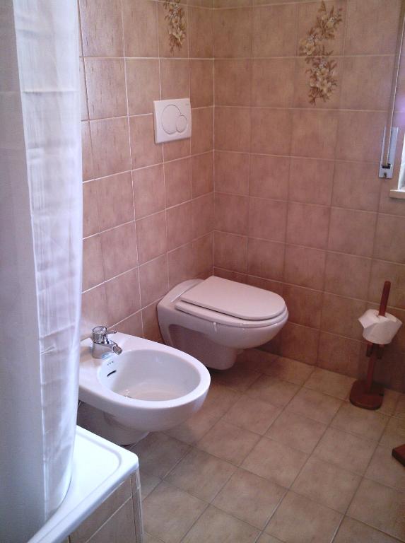 A bathroom at Donatella Apartment