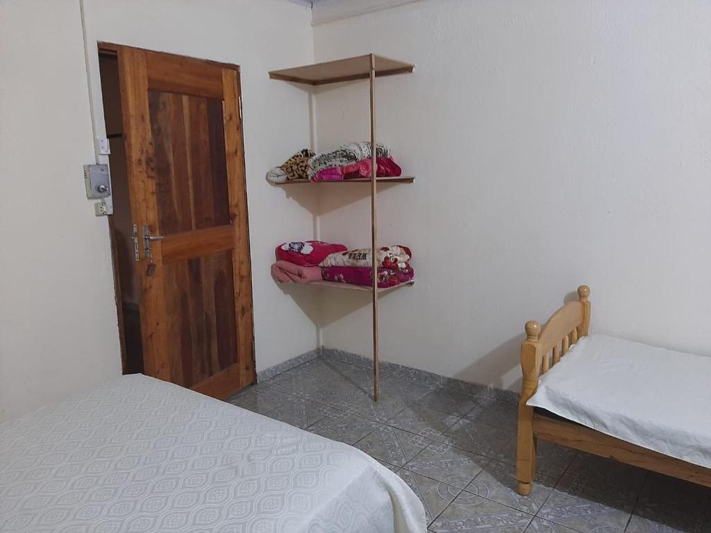 Postel nebo postele na pokoji v ubytování Posada las Mercedes
