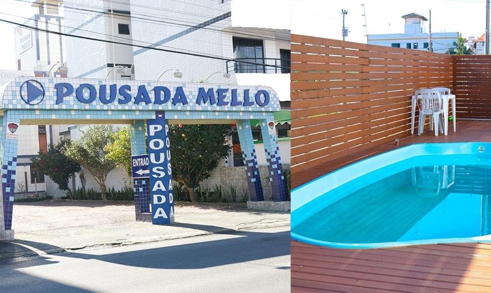 ein Schild für eine Villa mit einem Pool in der Unterkunft Pousada Mello in Arroio do Silva