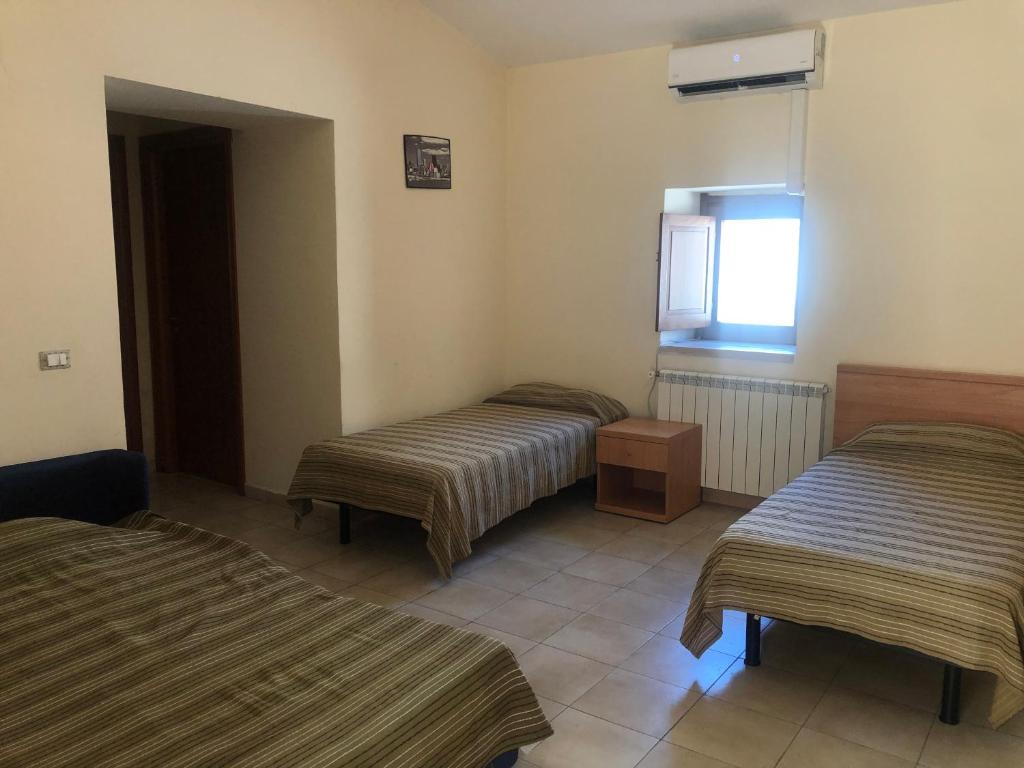 Posteľ alebo postele v izbe v ubytovaní Hostels Euro Mediterraneo