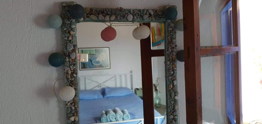 Postel nebo postele na pokoji v ubytování Stamatis Rooms