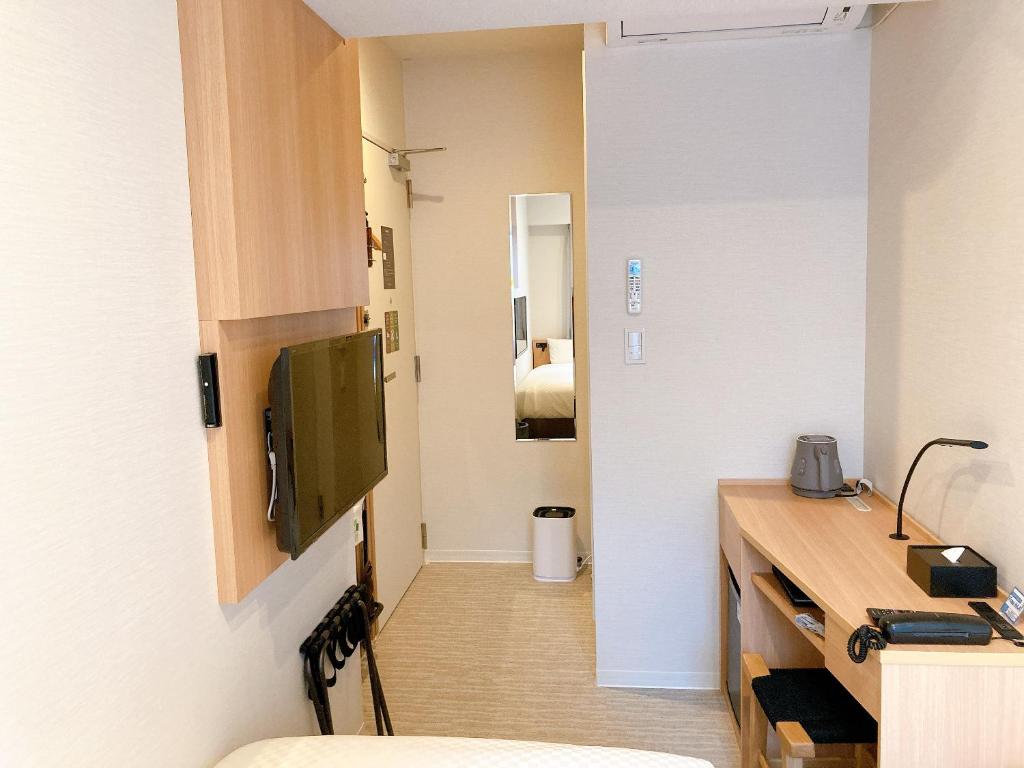 TV a/nebo společenská místnost v ubytování Nesthotel alt Kuramae Station