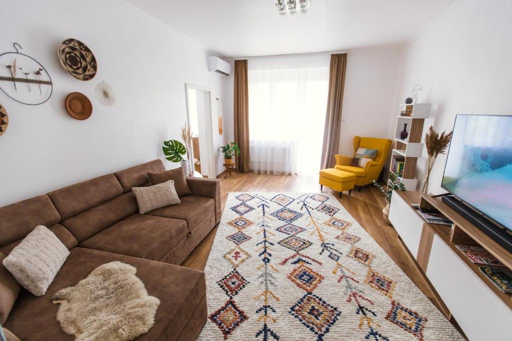 Televízia a/alebo spoločenská miestnosť v ubytovaní BohoHome Apartment Eger