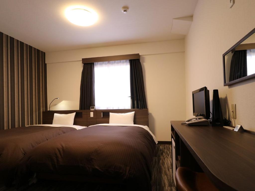 TV a/nebo společenská místnost v ubytování Odawara Terminal Hotel