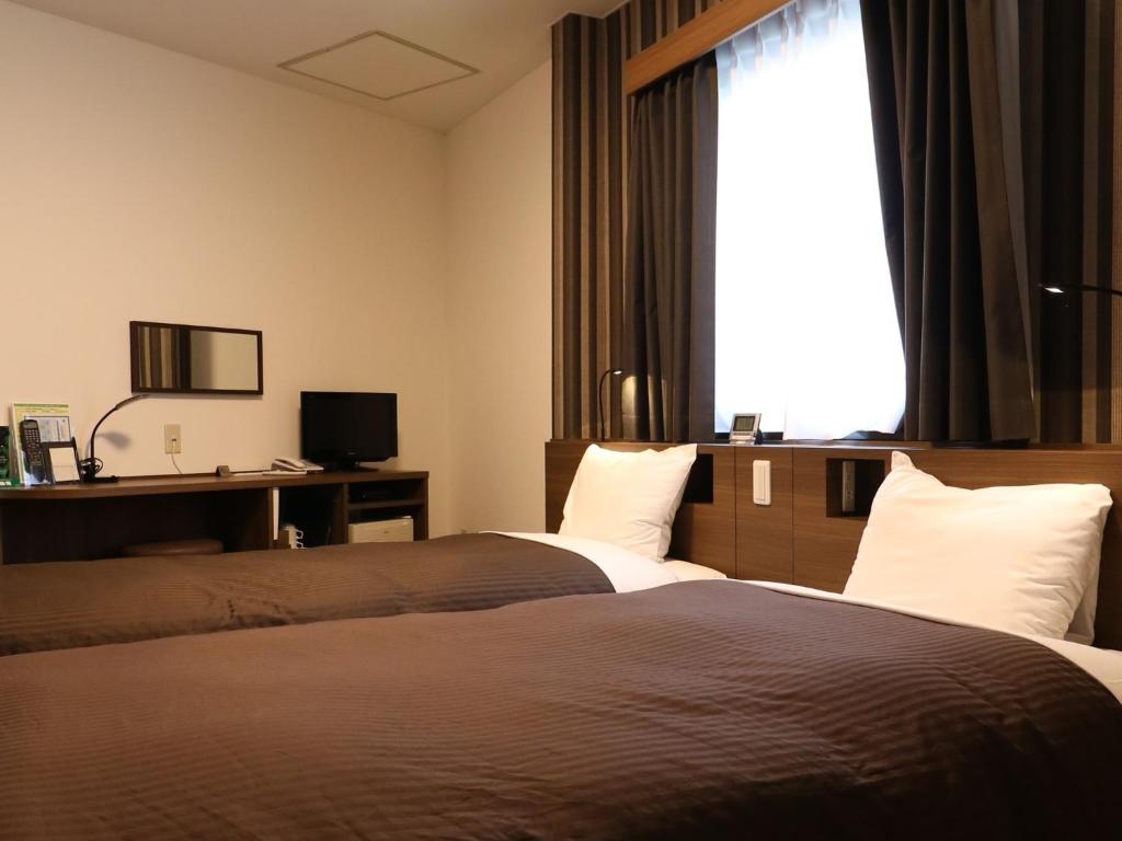 TV a/nebo společenská místnost v ubytování Odawara Terminal Hotel