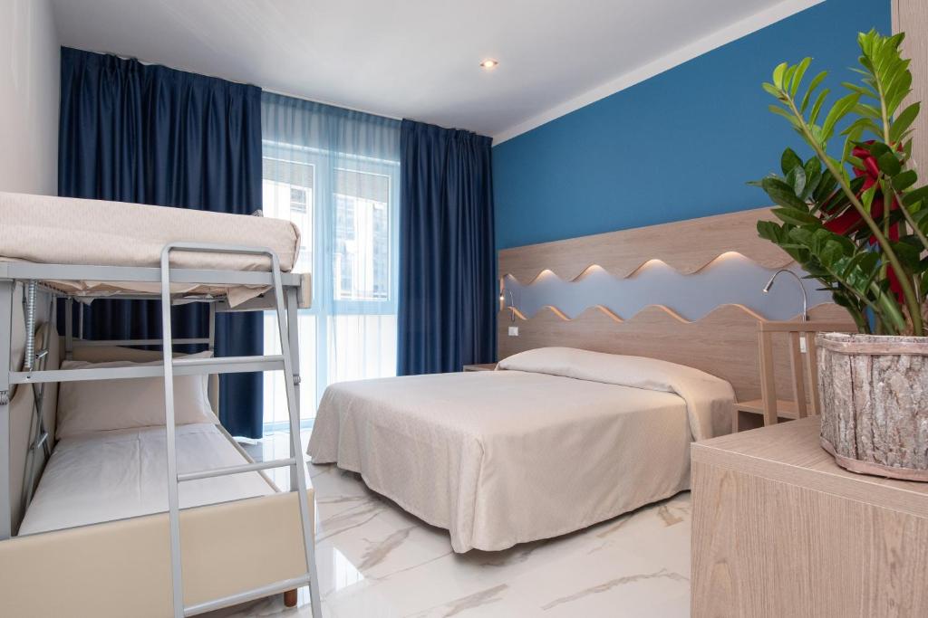 Postel nebo postele na pokoji v ubytování Hotel Marconi Express