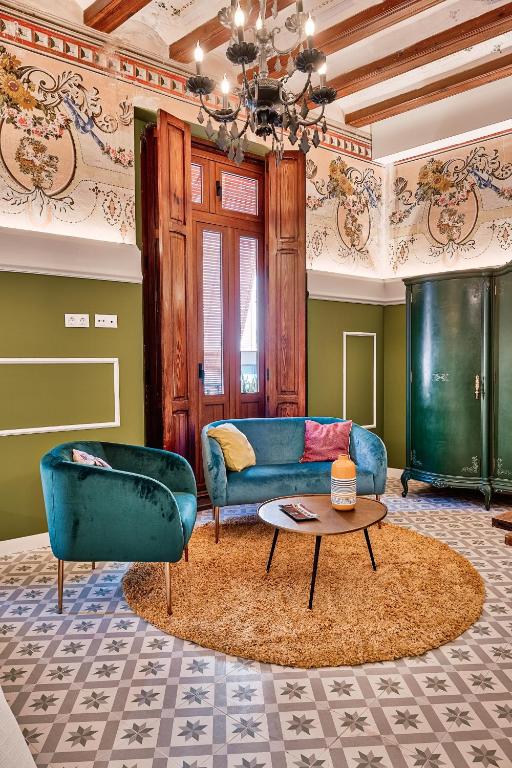 Posezení v ubytování Blaucel Cafè i Habitacions