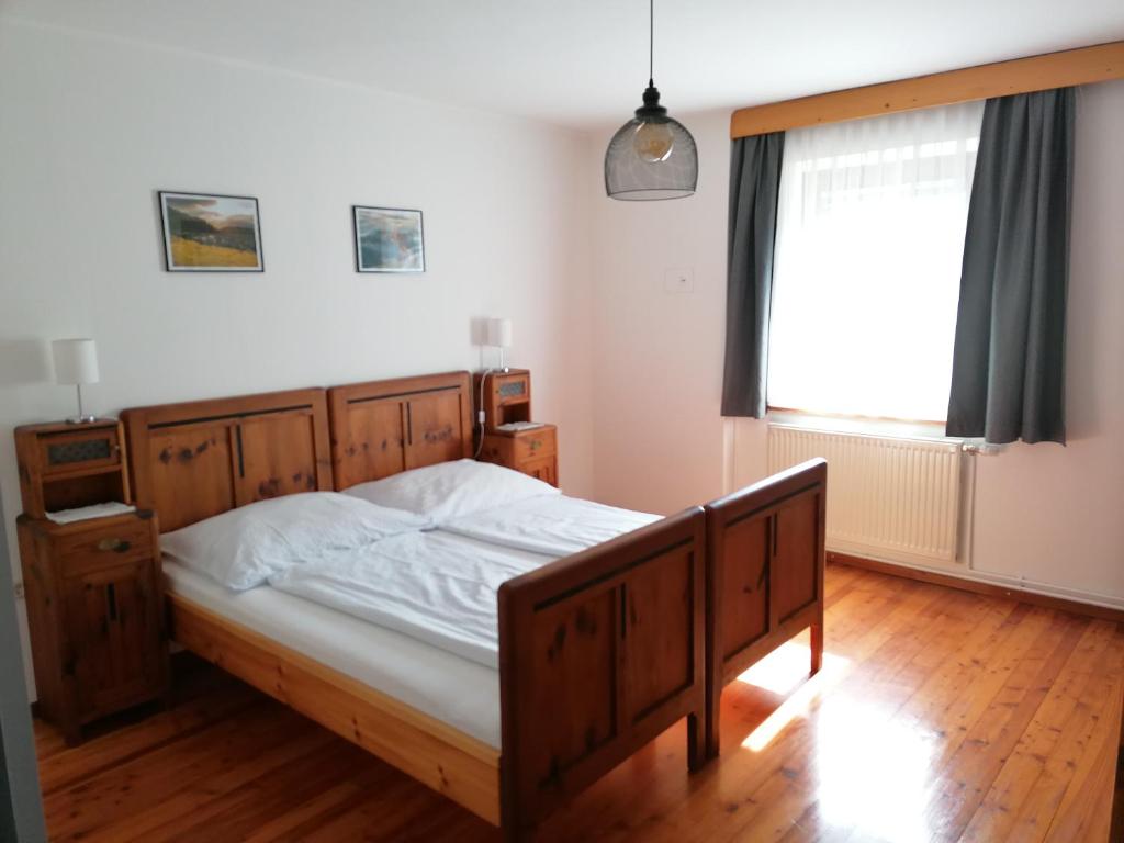 Postel nebo postele na pokoji v ubytování Haus Oswald am See