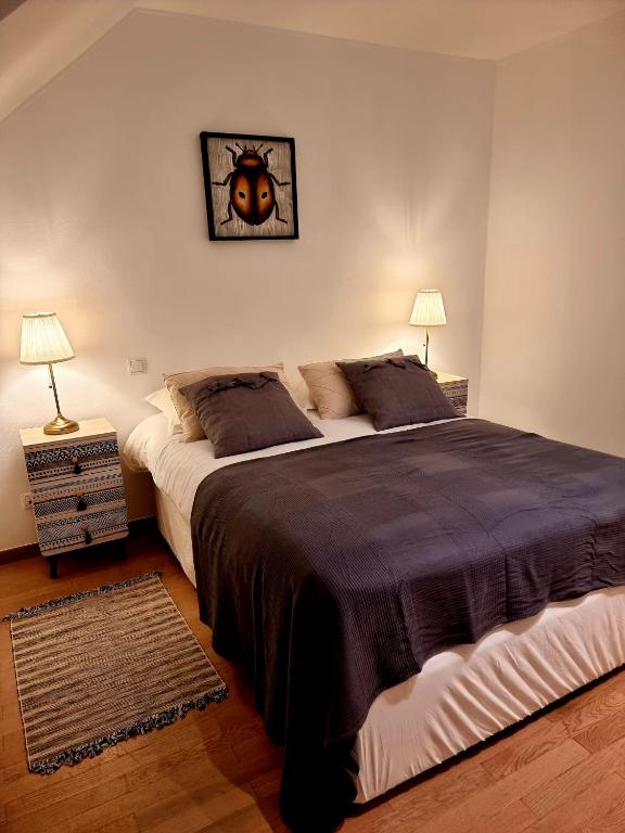 Postel nebo postele na pokoji v ubytování Restauberge Peitry