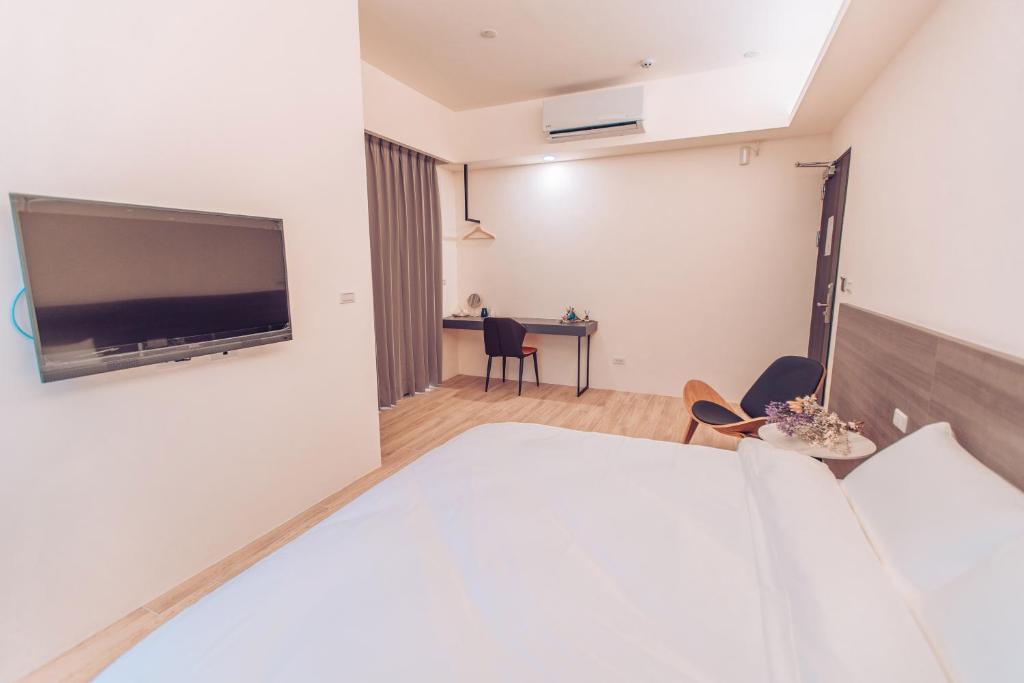TV a/nebo společenská místnost v ubytování The Pai Hotel