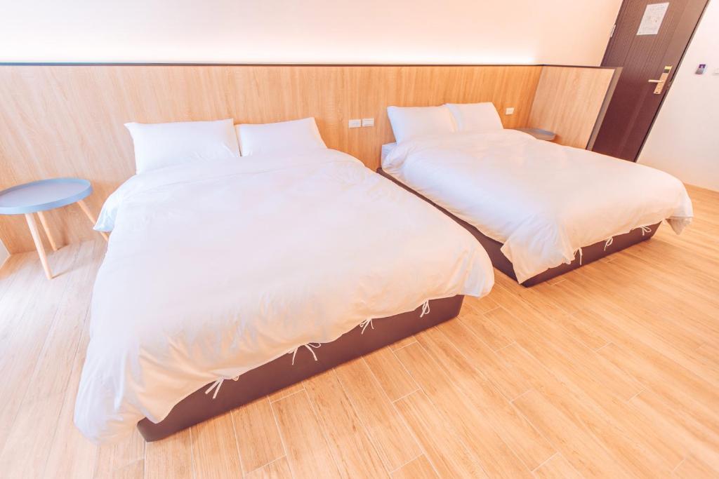 Postel nebo postele na pokoji v ubytování The Pai Hotel