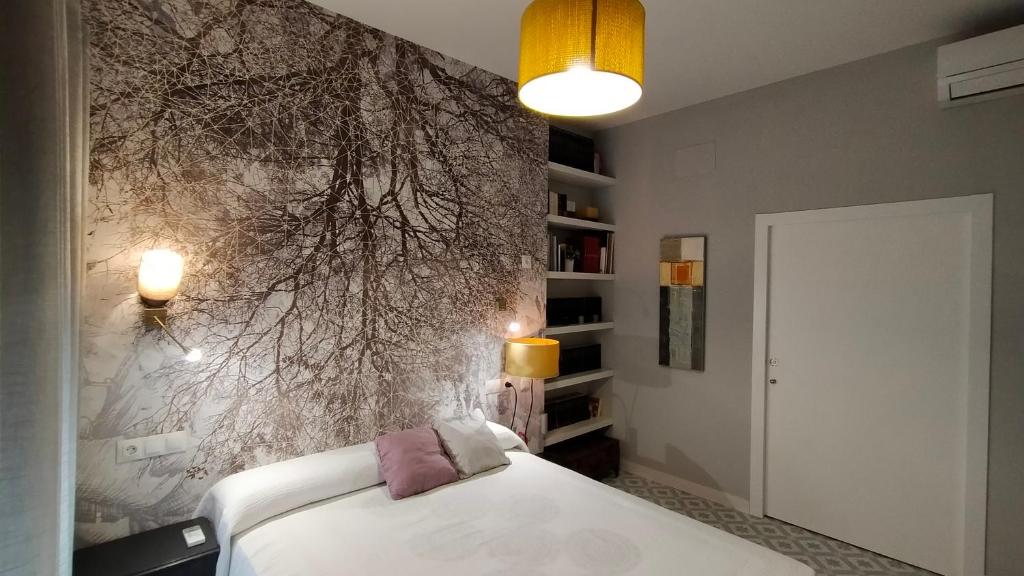 Postel nebo postele na pokoji v ubytování Blaucel Cafè i Habitacions