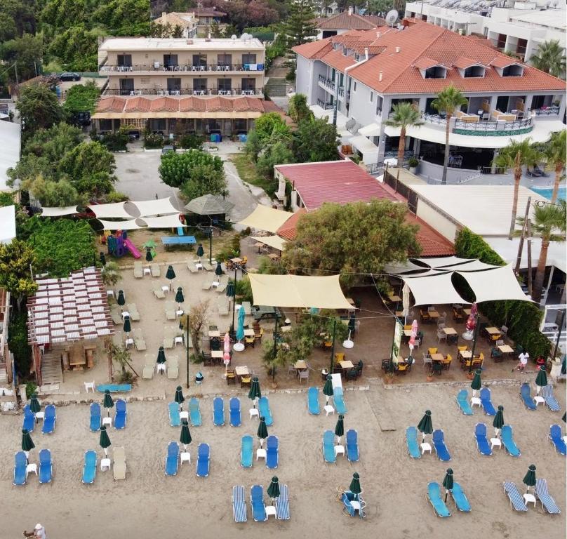 an aerial view of a patio with chairs and tables at Anetis Hotel in Tsilivi