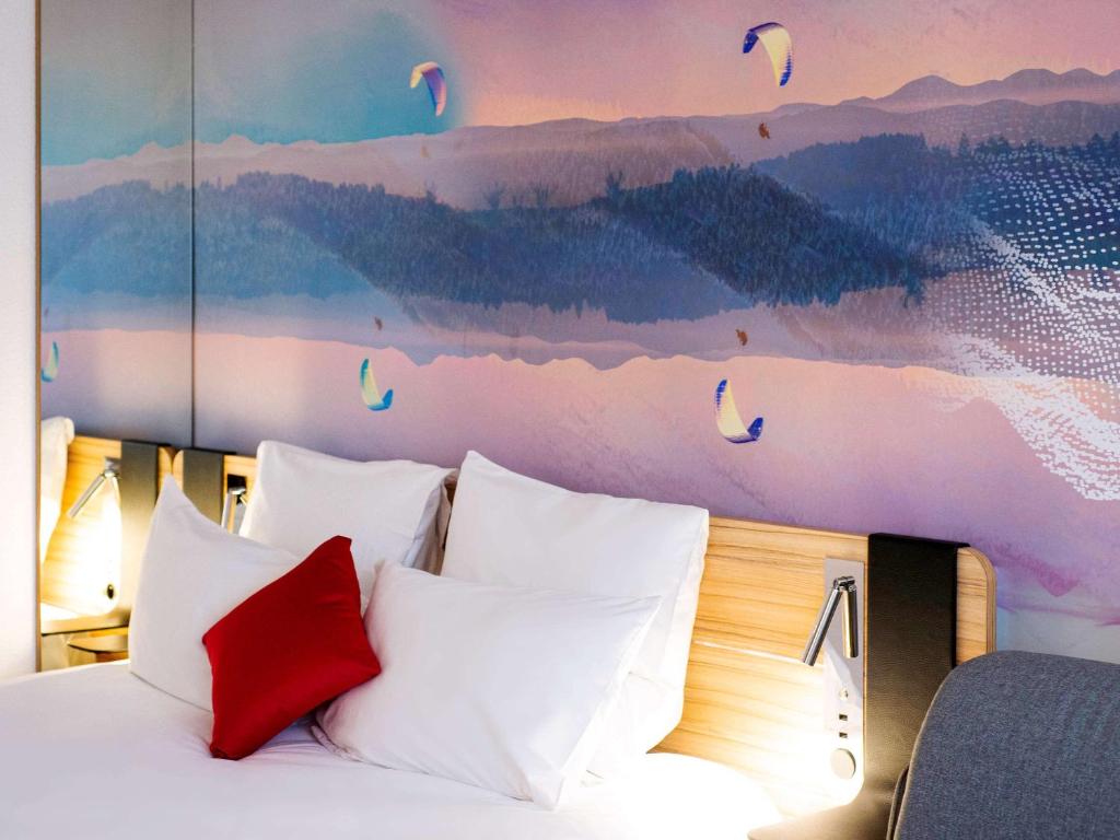 Postel nebo postele na pokoji v ubytování Novotel Clermont-Ferrand