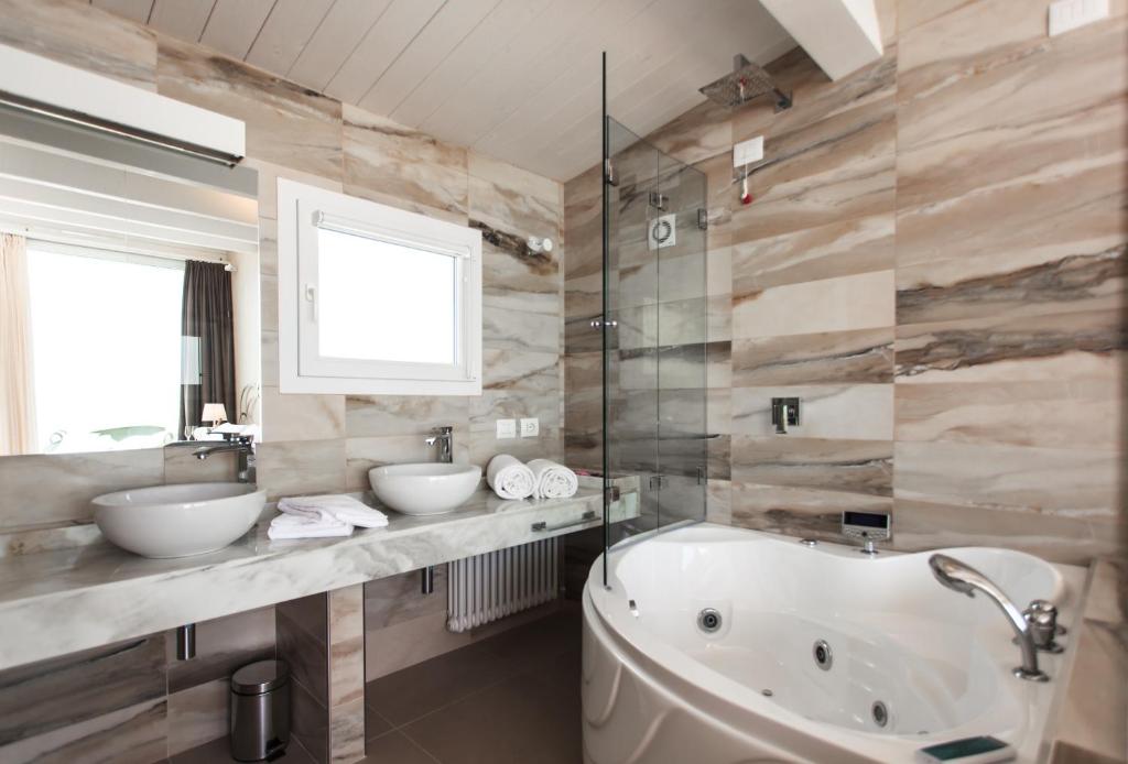 Koupelna v ubytování Princier Fine Resort & SPA