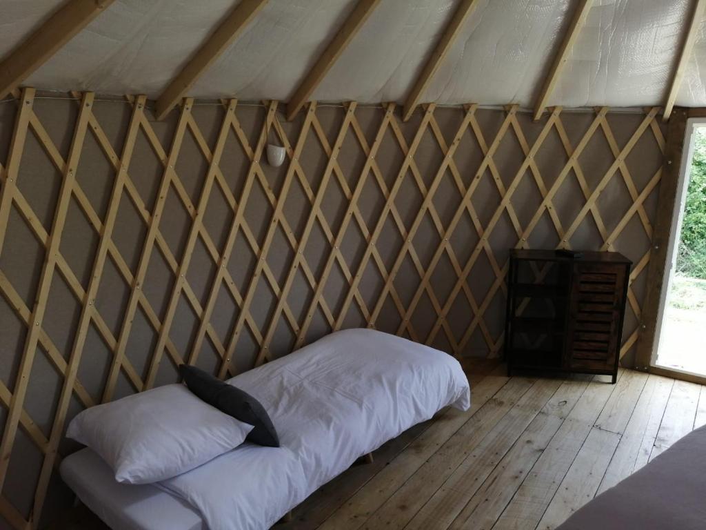 Postel nebo postele na pokoji v ubytování FERME DU CAROIRE