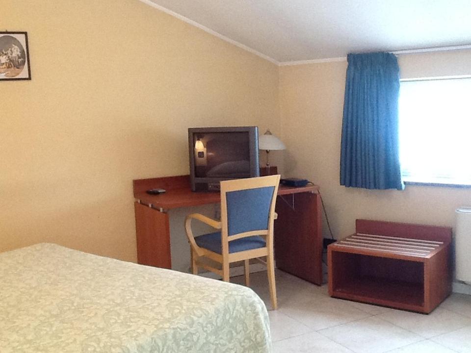 TV a/nebo společenská místnost v ubytování CerrutiHotel
