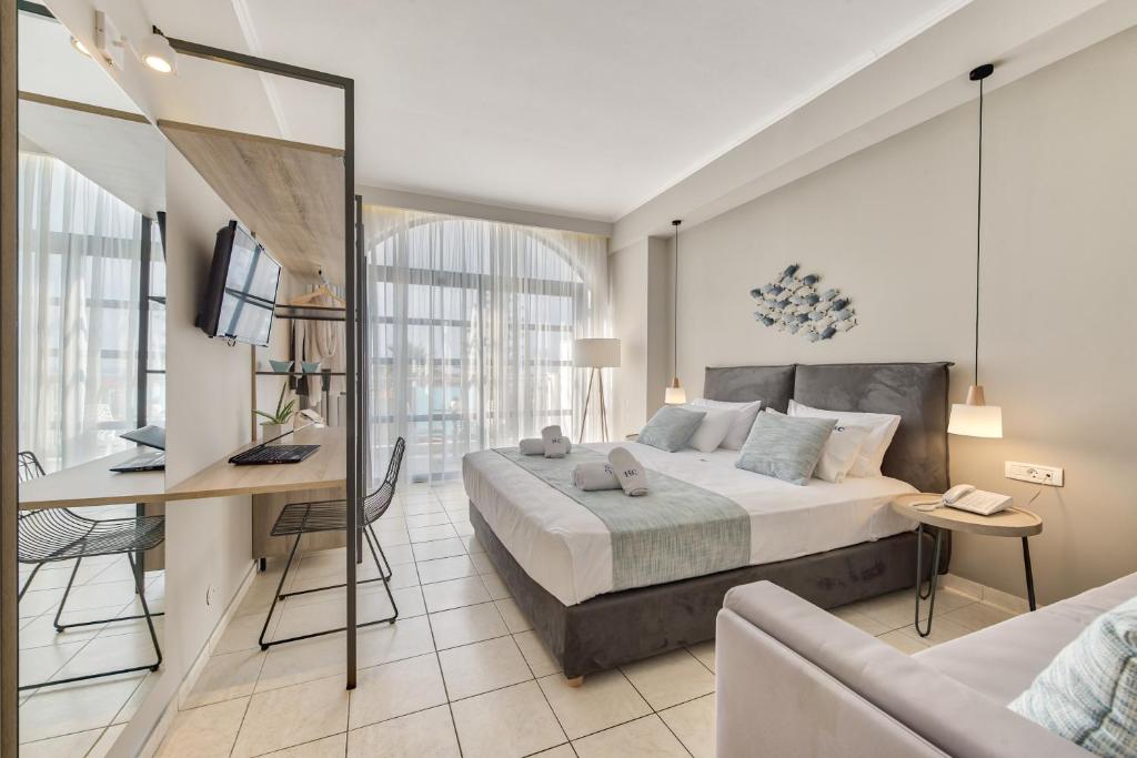Vuode tai vuoteita majoituspaikassa Contessa Hotel