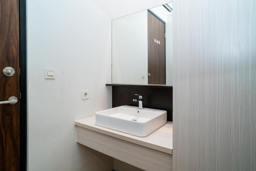 Koupelna v ubytování Three J Residence 2