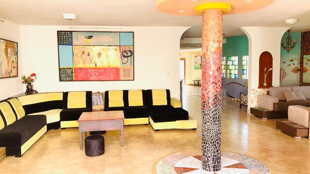 Posezení v ubytování Eco Hotel Katarma
