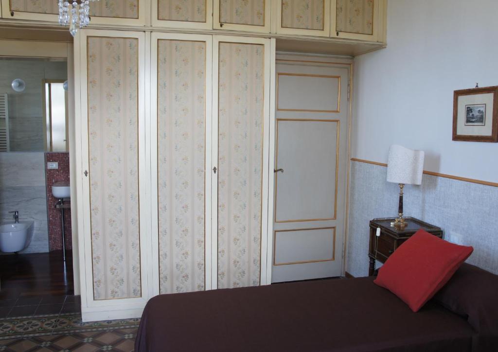 Postel nebo postele na pokoji v ubytování Villa Magnolia Park