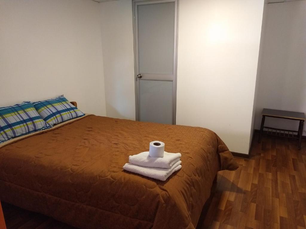 Letto o letti in una camera di Chelitos Backpacker
