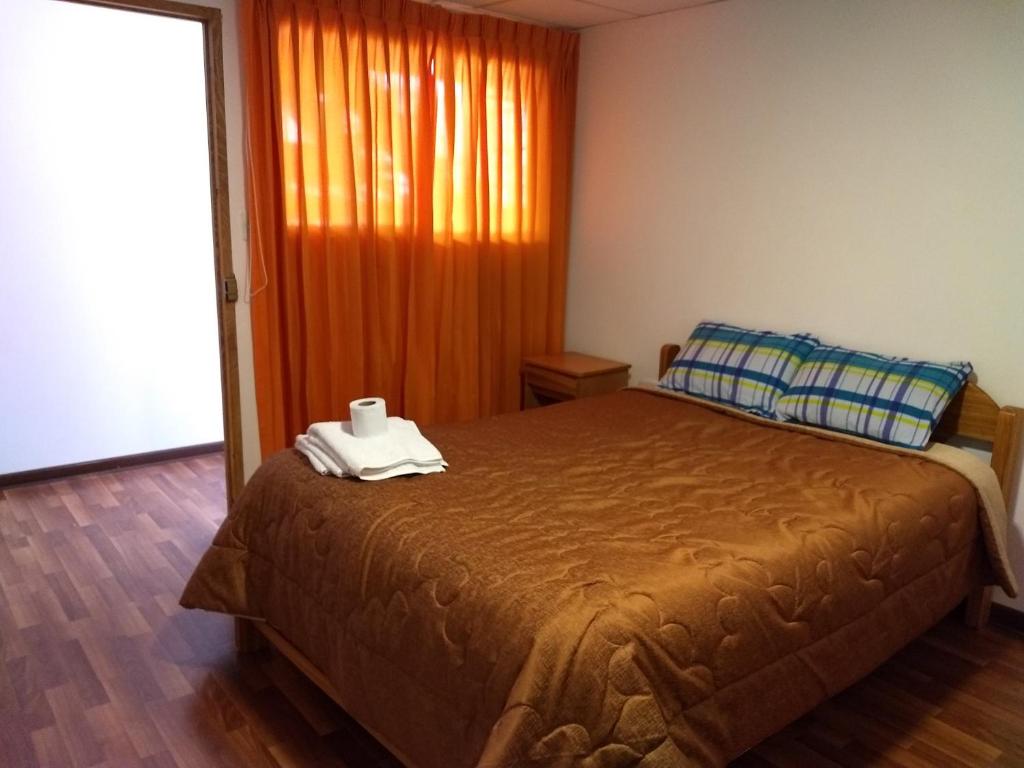 Letto o letti in una camera di Chelitos Backpacker