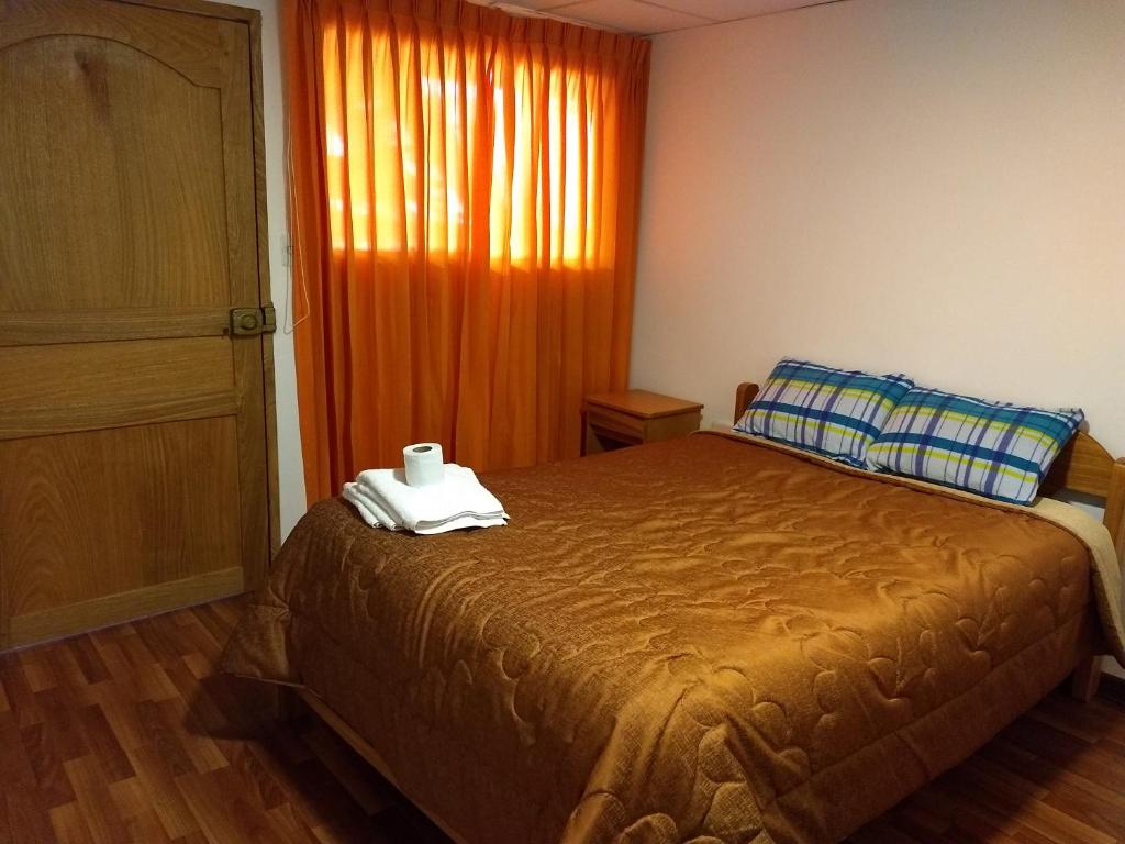 Letto o letti in una camera di Chelitos Backpacker