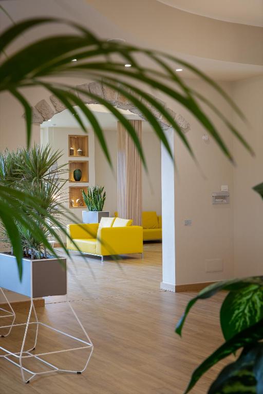 Posezení v ubytování Lu' Hotel Porto Pino