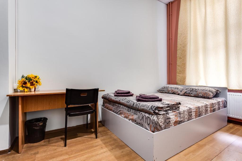 Postel nebo postele na pokoji v ubytování Mister Hostel