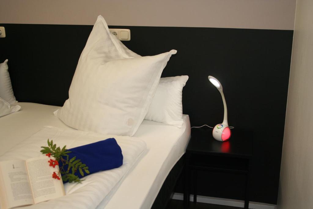 Postel nebo postele na pokoji v ubytování Mar Hotel