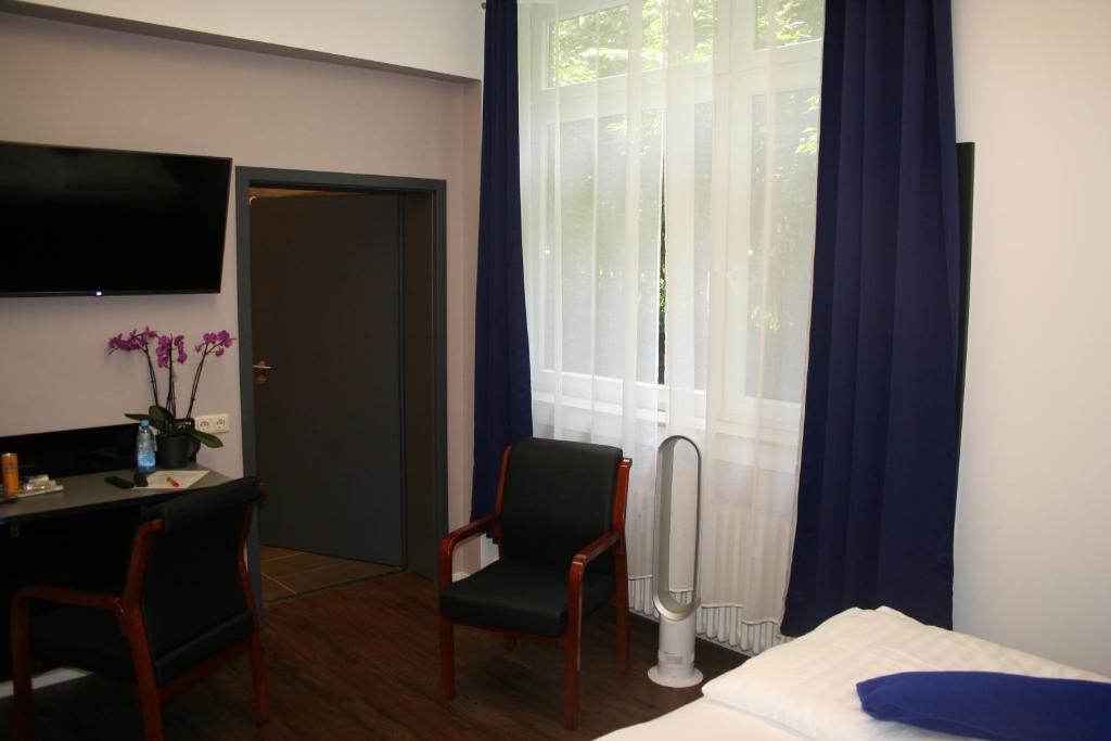 Postel nebo postele na pokoji v ubytování Mar Hotel
