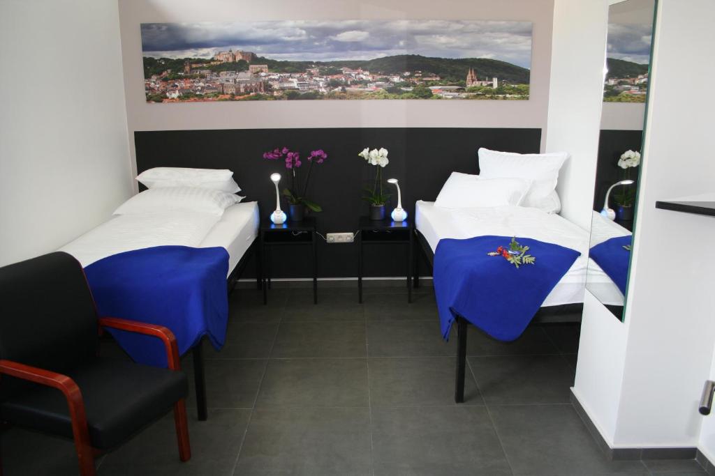Postel nebo postele na pokoji v ubytování Mar Hotel
