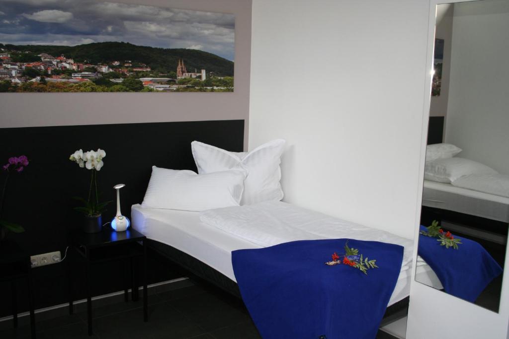 Postel nebo postele na pokoji v ubytování Mar Hotel