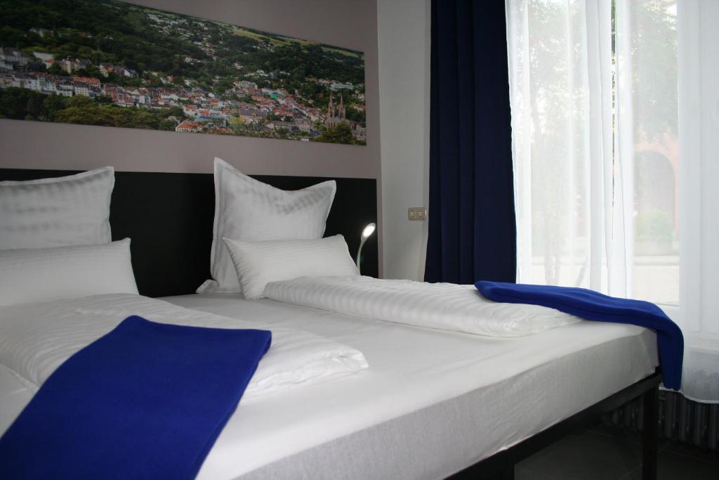 Postel nebo postele na pokoji v ubytování Mar Hotel