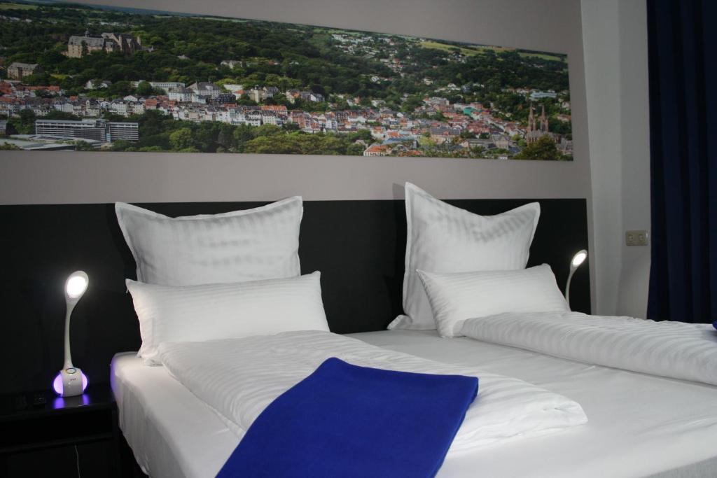 Postel nebo postele na pokoji v ubytování Mar Hotel