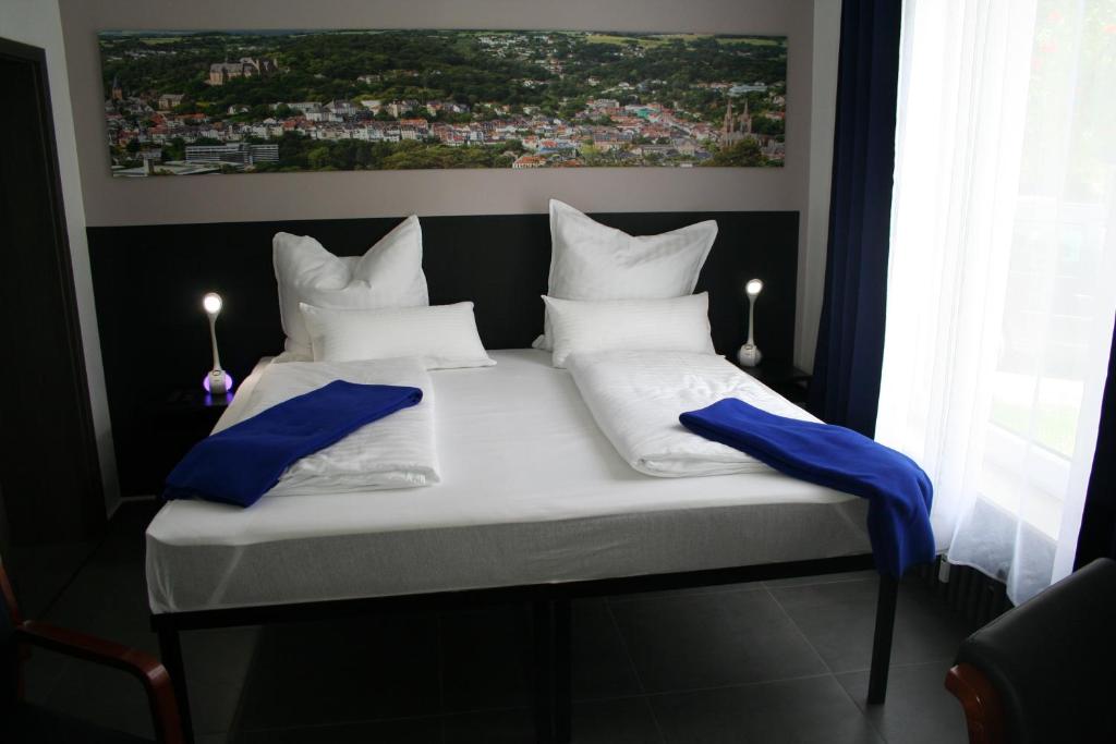 Postel nebo postele na pokoji v ubytování Mar Hotel