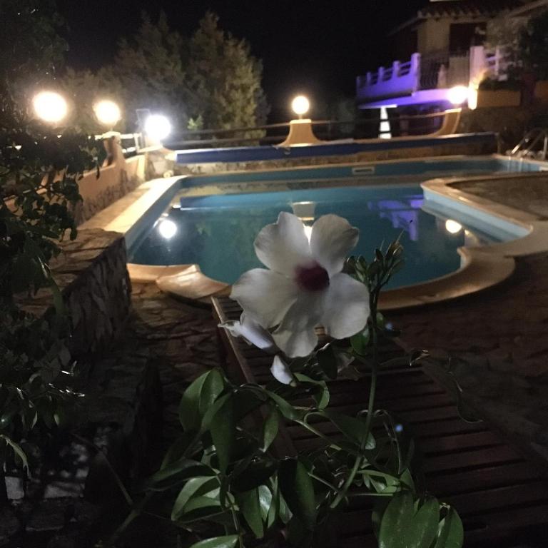 The swimming pool at or close to VILLA VITTORIA with PRIVATE HEATED SWIMMING POOL COMPLETE WITH HIDROMASSAGE FOR EXCLUSIVE USE , SEA VIEW, 150 METERS FROM THE BEACH