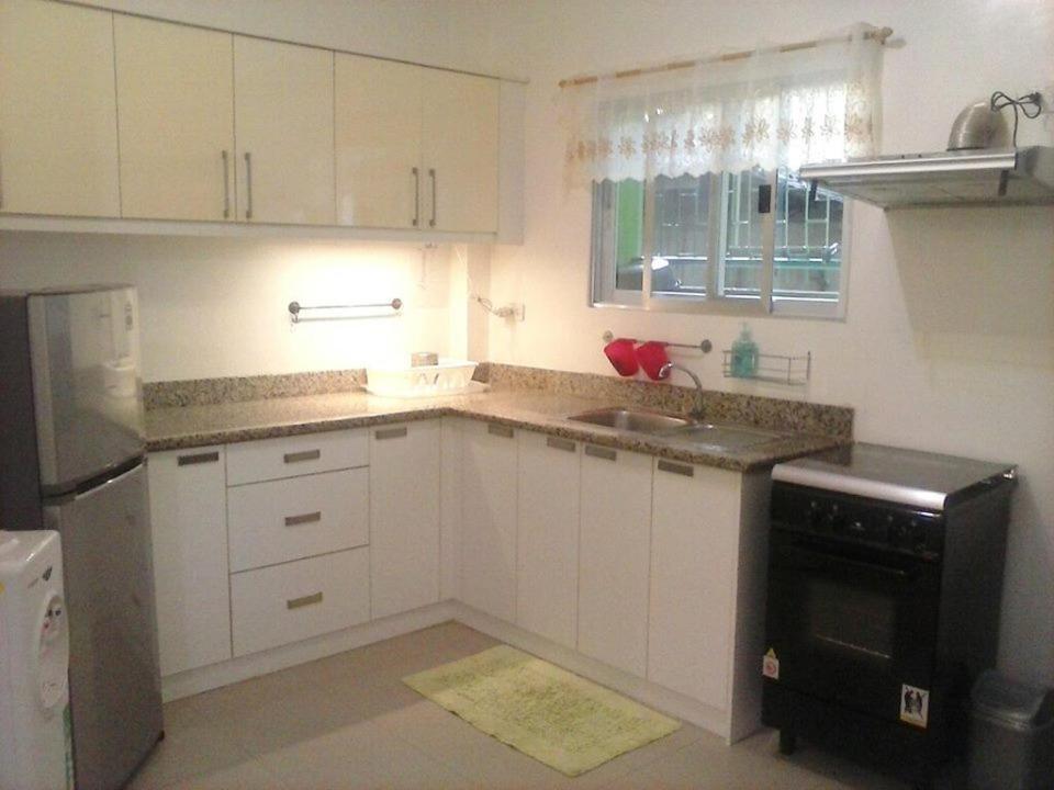 Kuchyň nebo kuchyňský kout v ubytování Magdalene Apartment