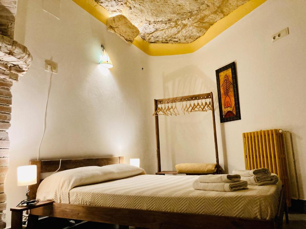 Postel nebo postele na pokoji v ubytování Casa rural cueva El Nido