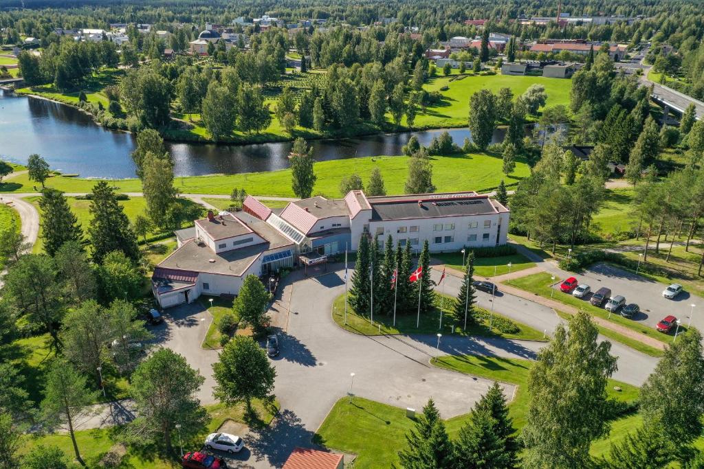 an aerial view of a building next to a river at Hotel Kurikka in Kurikka