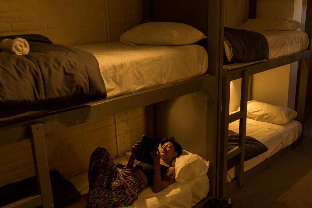 Postel nebo postele na pokoji v ubytování Hostel Hormiga Negra